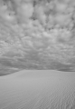 Sand dune and clouds